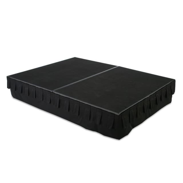 Lifted stage with surface of black vinyl. Includes black side skirts.