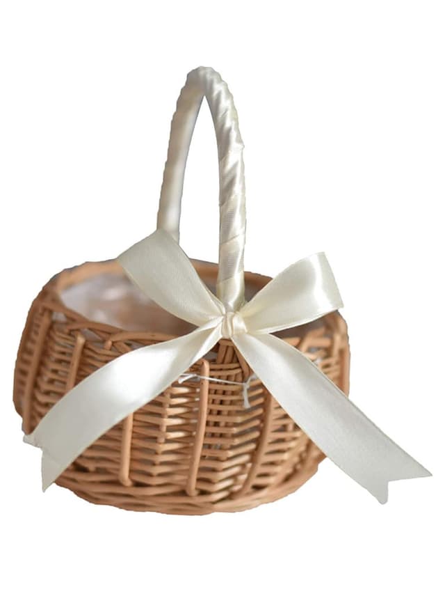 Rattan flower girl basket with a soft satin ribbon, measuring 5.9 inches in diameter and 7.4 inches in height, showcasing a natural woven design.