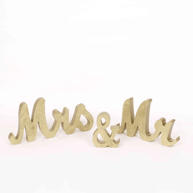 Wooden Mr & Mrs tabletop sign with gold glittered letters, featuring 'Mr', 'Mrs', and '&' in an elegant design.