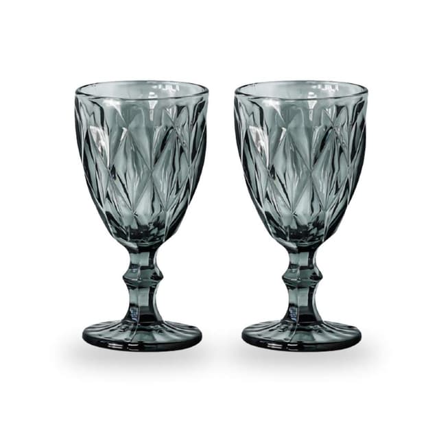Two elegant dark blue diamond-cut glass goblets with a 10 oz capacity, featuring intricate faceted patterns on the bowl and a sturdy stem, set against a plain white background.