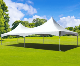 White 20x40 event tent providing elegant shade on grassy field